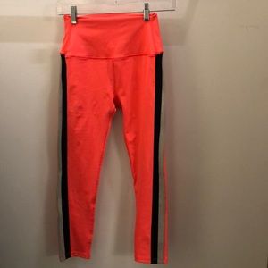 Splits 59 orange tan black legging, sz M, 71504